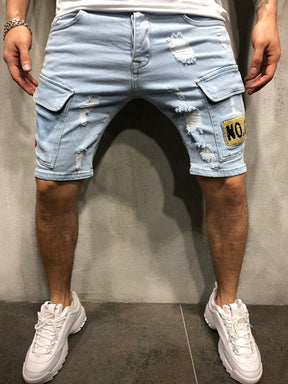 Stylish Flap Pocket Torn Denim Shorts